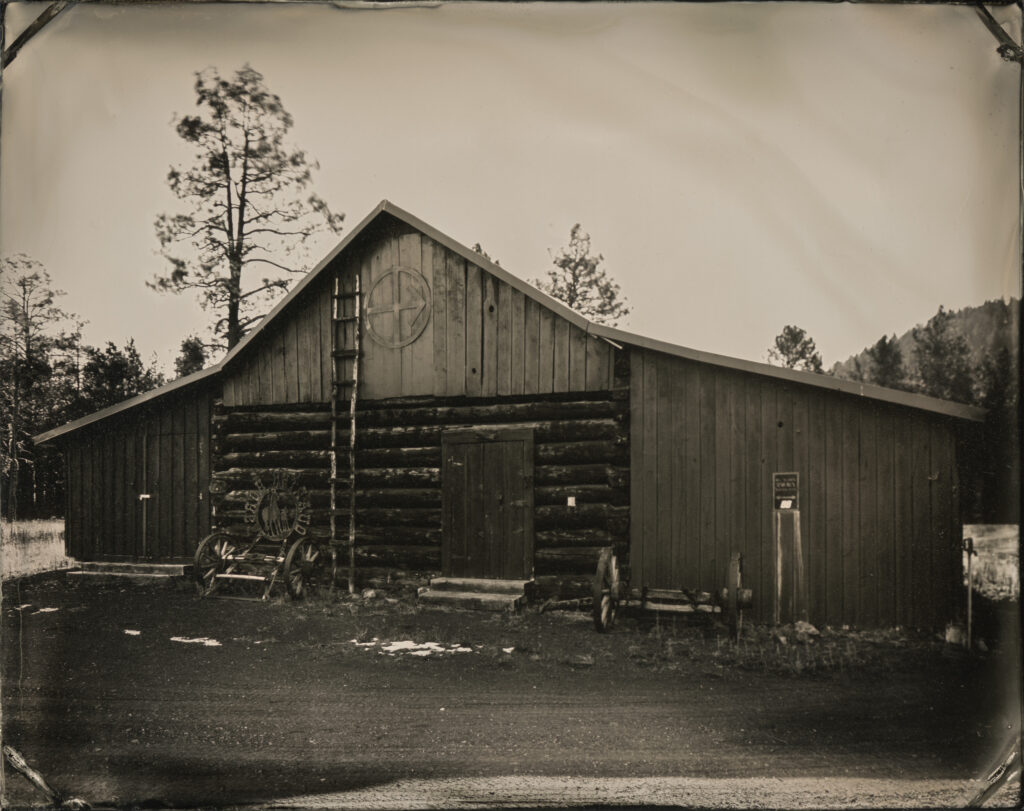 Tintype photograph of an old log barn near Flagstaff, Arizona